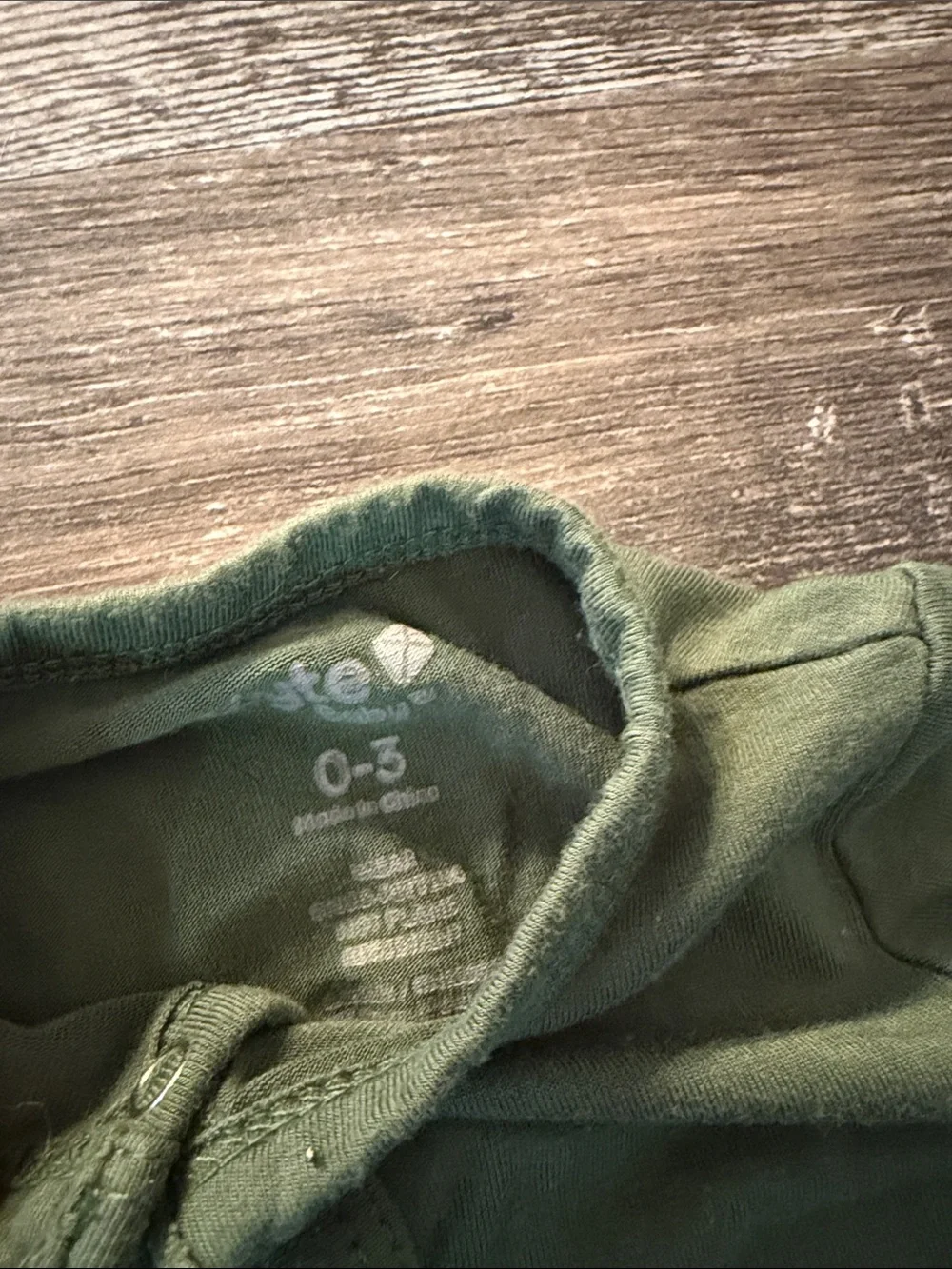 Kyte Baby Button Footie Pajamas in Olive Green color
